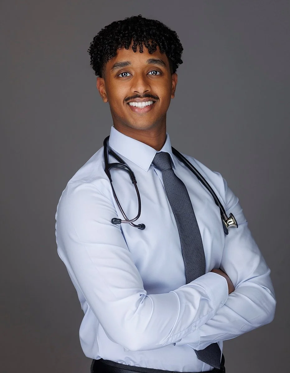 Professional headshot on a clean studio background