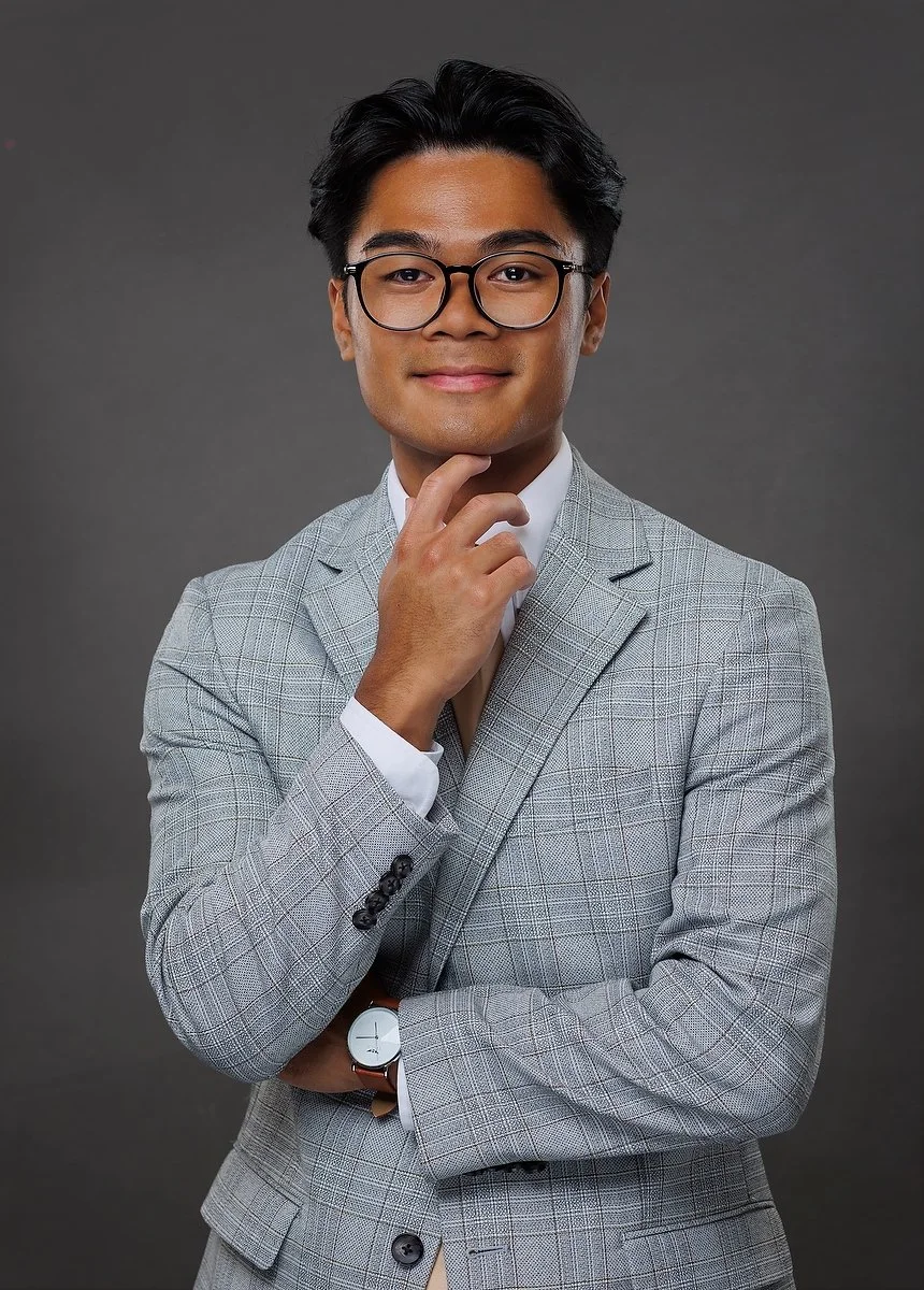 Professional headshot on a clean studio background